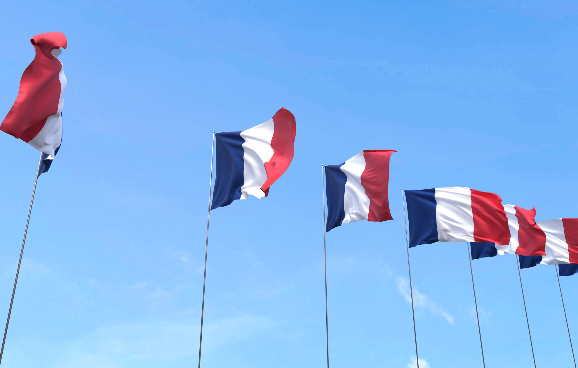 france-flag-waving-blue-sky-background